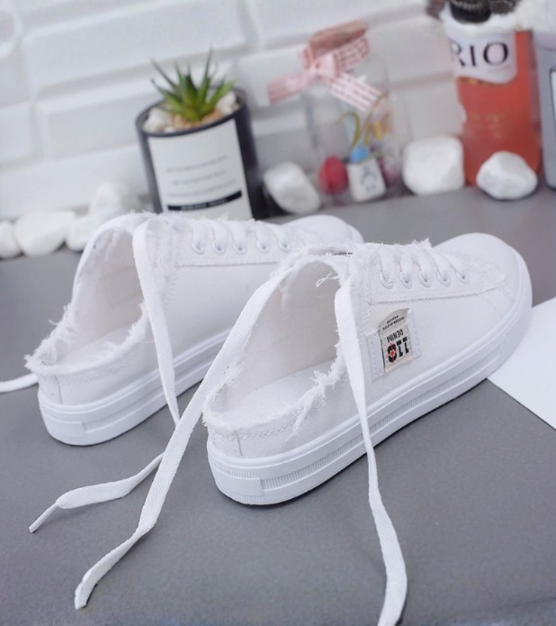 Lily | Le Nuove Sneaker Sabot Sfrangiate in Tessuto Denim